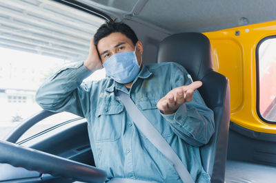 Man sitting in bus