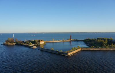 Scenic view of sea against clear blue sky