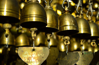 Gold bells hanging at wat phra that hariphunchai is a buddhist temple in lamphun, thailand.