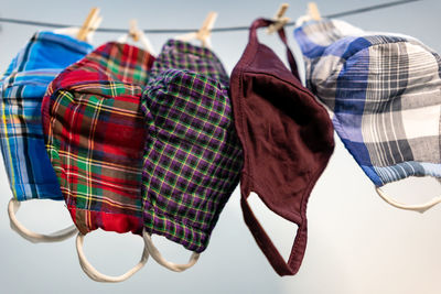 Close-up of multi colored umbrellas hanging