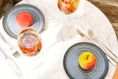 High angle view of drink in glass on table