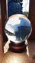 Close-up of crystal ball on table