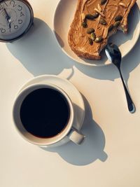 High angle view of coffee cup on table