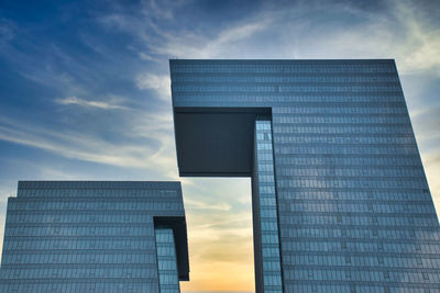 Low angle view of modern building against sky