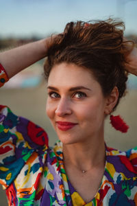 Close-up portrait of a smiling young woman