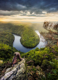 Scenic view of lake against sky during sunset