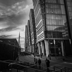 Modern buildings in city against sky