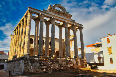 Low angle view of old temple against sky