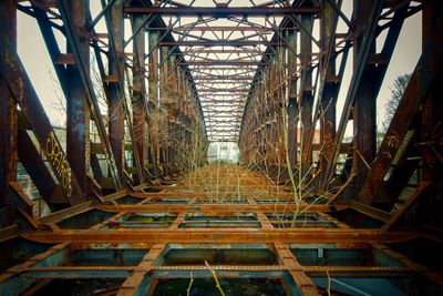 Rusty metal bridge in factory