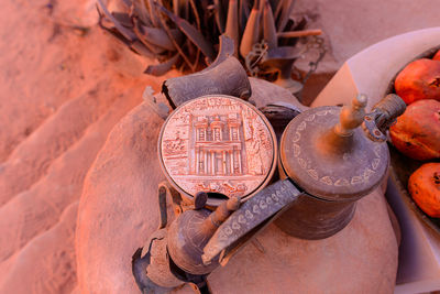 High angle view of text on rusty metal