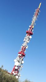 Low angle view of tower against clear blue sky