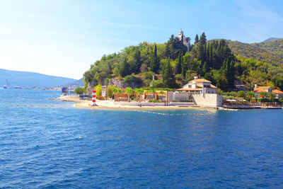 Restaurant and beach club . coastal terrace at kotor bay in montenegro . pedjina crkva church 