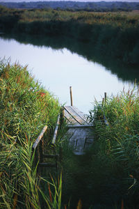 High angle view of wooden post in lake