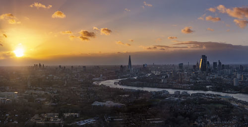 High angle view of townscape against sky during sunset