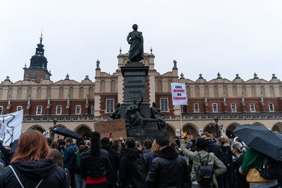 Group of people in front of building