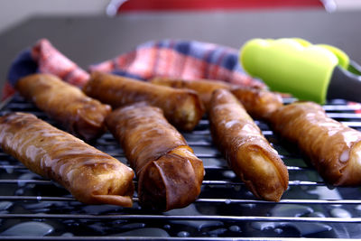 High angle view of meat on barbecue grill