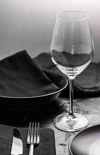 Close-up of wineglass on table