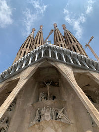 Low angle view of statue against sky