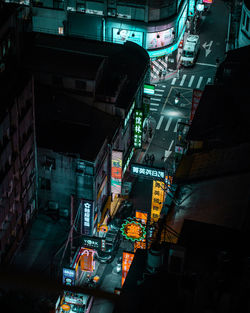 High angle view of illuminated city street at night