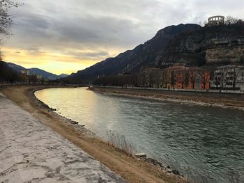 Scenic view of lake against sky during sunset