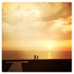 Scenic view of sea at sunset