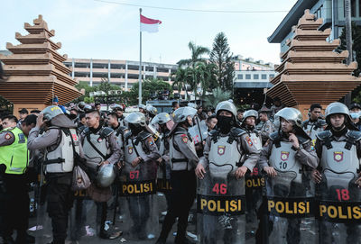 Rear view of police men