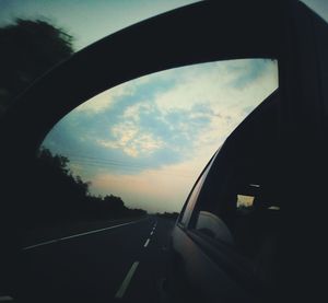 Road seen through car window