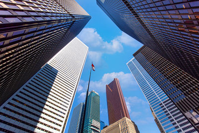 Low angle view of modern buildings against sky