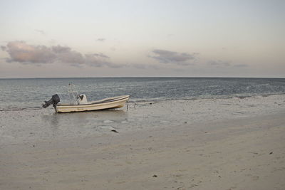 View of boats in calm blue sea