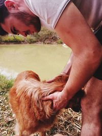 Midsection of woman with dog