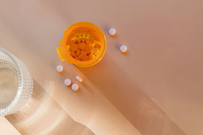 High angle view of pills in container