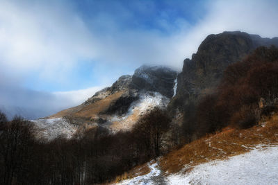 Scenic view of mountain against sky during winter