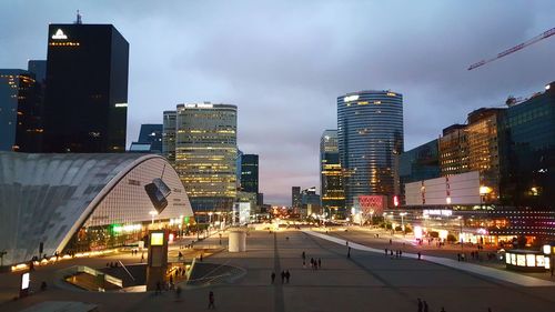 City lit up at dusk