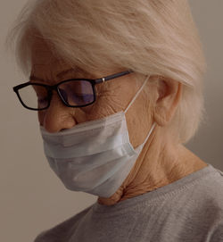 Close-up portrait of woman wearing hat