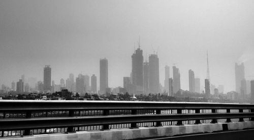 View of cityscape against clear sky