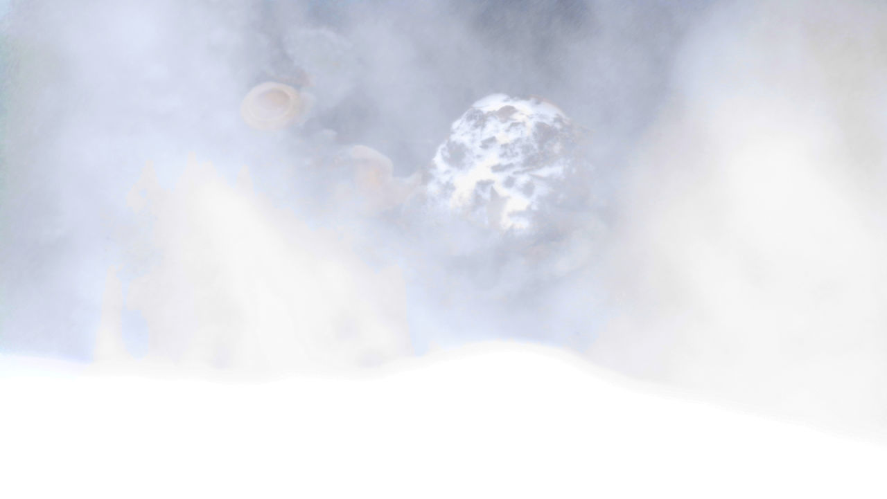 LOW ANGLE VIEW OF CLOUDS IN SNOW