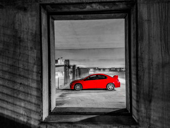 Red car on window