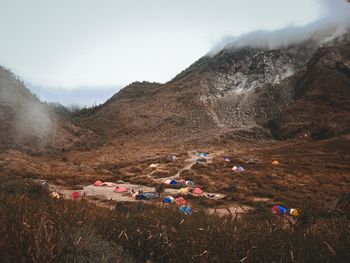 Scenic view of landscape and mountains against sky