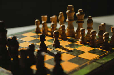 Close-up of chess pieces on board