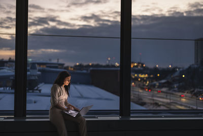 Businesswoman working late in office