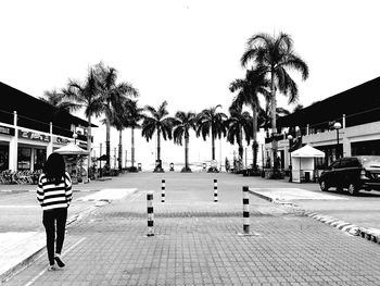 People walking on road in city