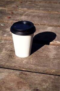 High angle view of black coffee on table