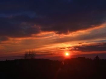 Scenic view of silhouette landscape against sky during sunset