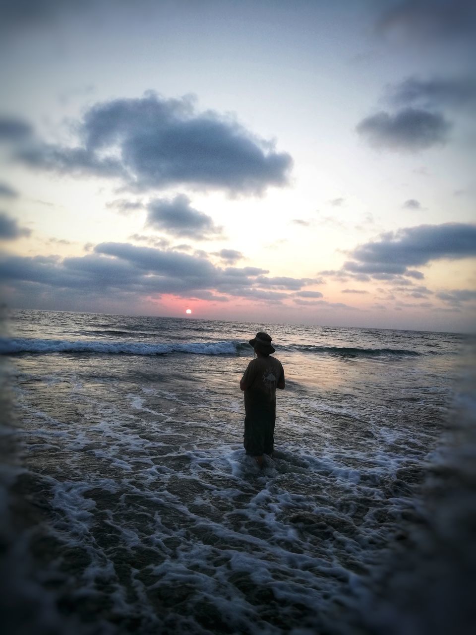 sky, sea, water, sunset, beauty in nature, cloud - sky, beach, horizon, horizon over water, land, rear view, real people, scenics - nature, one person, leisure activity, lifestyles, nature, silhouette, men, outdoors