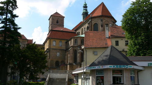 Low angle view of bell tower against sky