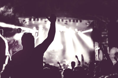 Crowd enjoying in music festival at night