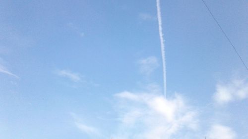 Low angle view of vapor trail in sky