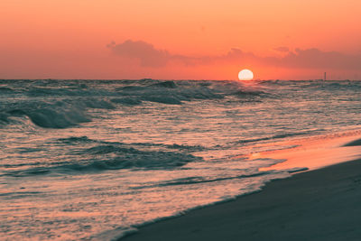 Scenic view of sea against sky during sunset