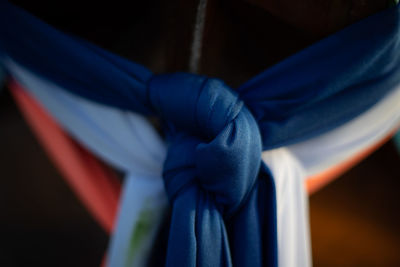 Close-up of human hand holding flag