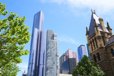 Low angle view of skyscrapers against sky